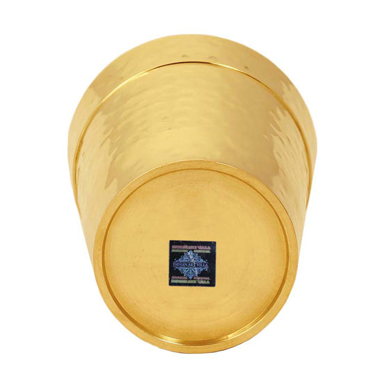 Brass tea glass with a refined plain finish, a perfect blend of minimalism and luxury for your tea collection.