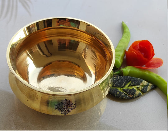 Polished brass handi in plain design featuring smooth reflective surface wide opening and circular base construction