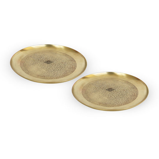 Traditional brass thali set by Indian Art Villa crafted in smooth matte finish with engraved floral pattern across the center