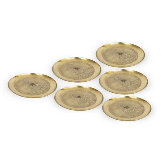Round brass thali sest of 6 by Indian Art Villa with gentle matte finish and ornamental floral center reflecting Indian elegance