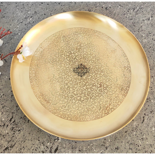 Indian Art Villa round brass plate in matt finish with ornate floral embossing and polished handcrafted appearance