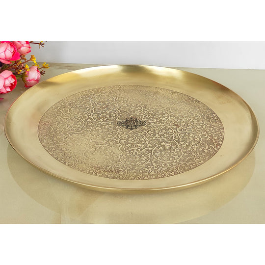 Handcrafted brass thali by Indian Art Villa designed with embossed detailing and smooth brushed matte surface