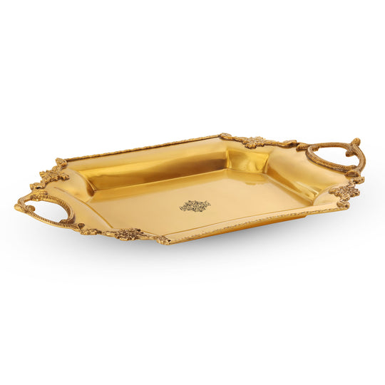 Decorative brass platter with curved handles perfect for showcasing return gifts during traditional Indian functions