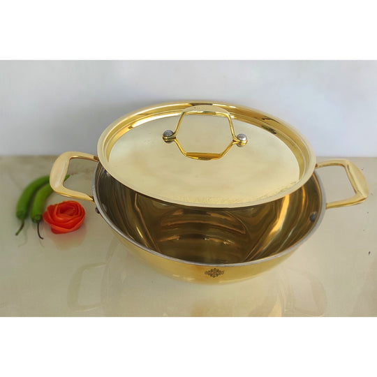 Traditional pital kadhai with golden polished body tin coated interior sturdy double handles and a matching brass lid