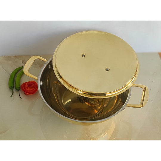 Bright golden Indian Art Villa pital kadhai piece with circular form inner tin lining fitted brass lid and twin handles