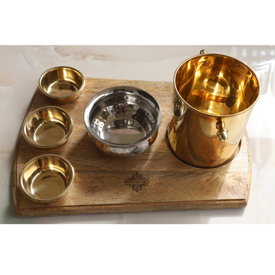 Indian Art Villa traditional brass food warmer set featuring wood base steel cover and three small round brass bowls