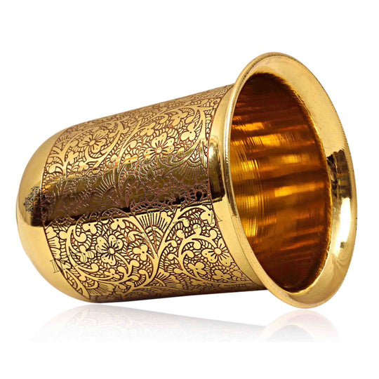 Brass tumbler with curved embossed design ideal for gifting at Indian Art Villa combining timeless elegance and cultural beauty