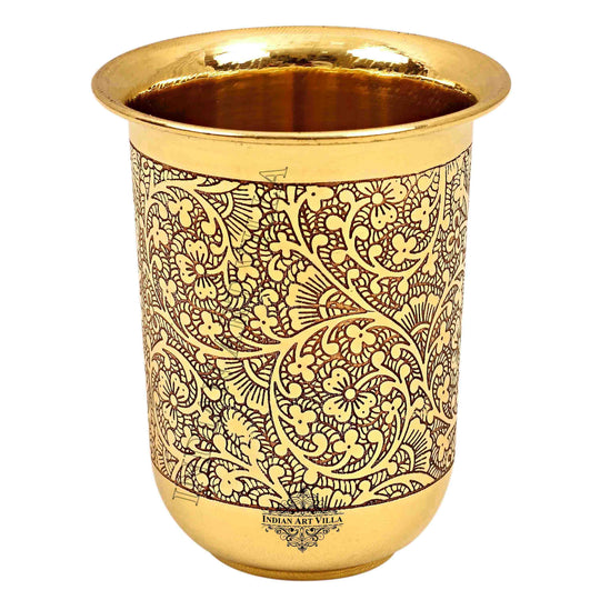 Elegant brass glass with embossed design perfect for pooja rituals at Indian Art Villa enhancing spiritual wellness
