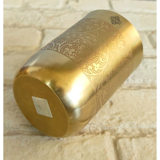 Pure brass drinking glass with elegant embossed patterns and matt finish from Indian Art Villa for home and restaurant