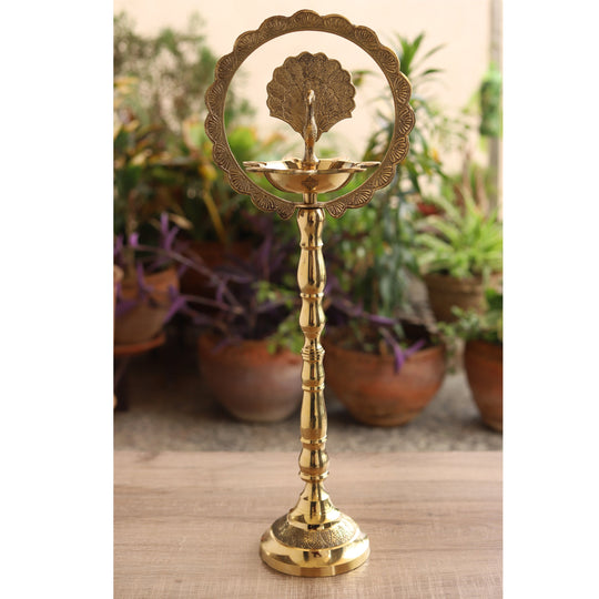 Indian Art Villa brass peacock diya stand with intricate design, perfect for traditional pooja and home decor.