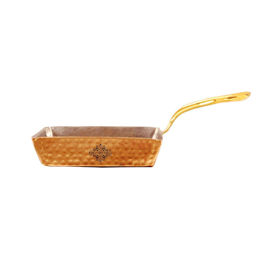 Distinctive hammered square copper pan with tin-coated interior for perfect meal preparation