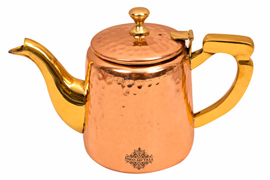 Copper hammered tea pot with brass handle and spout tin lining inside for durability and long lasting use by Indian Art Villa