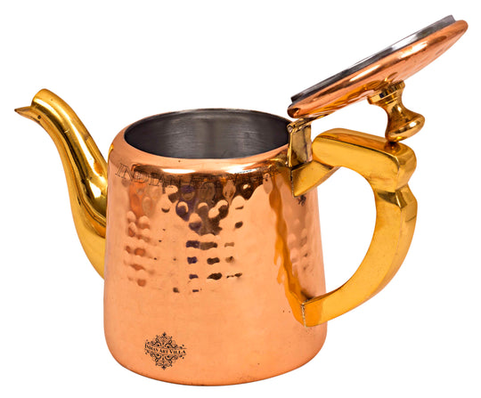Handcrafted cooking pot with brass accents, offering excellent heat distribution and durability, available at Indian Art Villa.