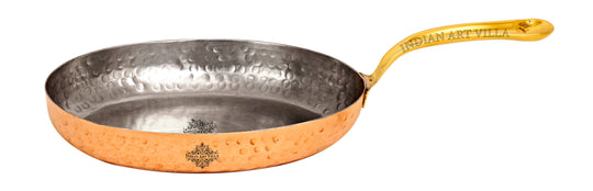 Pure copper oval pan with brass handle and tin lining designed by Indian Art Villa for efficient cooking and serving.