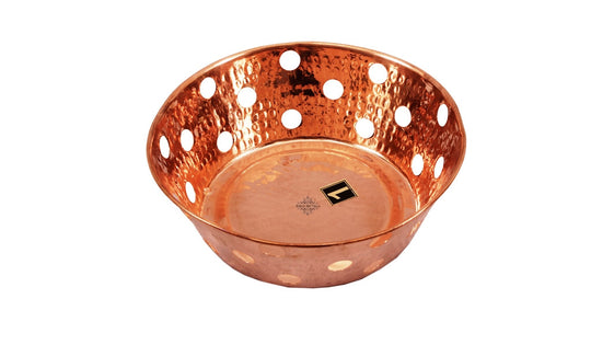 A pack of 2 copper tone round baskets with artisanal hammer work designed for elegant dining or spiritual offerings
