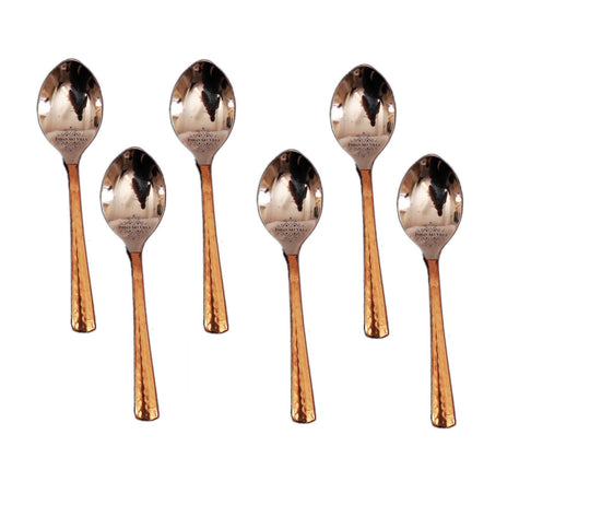 Set of 6 steel copper tea spoons with hammered finish, perfect for stirring hot beverages or serving desserts at home.