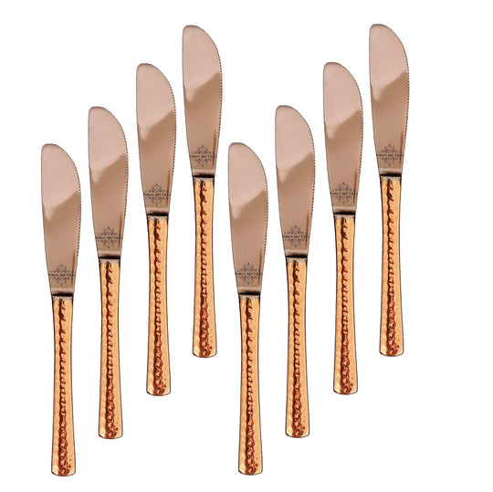 Set of 8 finely crafted copper butter spreaders with hammered copper handles and high-quality stainless steel blades.