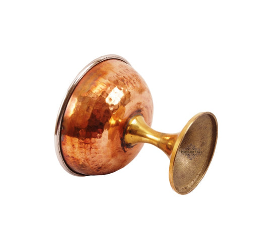Handcrafted copper and brass ice cream bowl with a pedestal perfect for serving frozen treats in style and luxury.