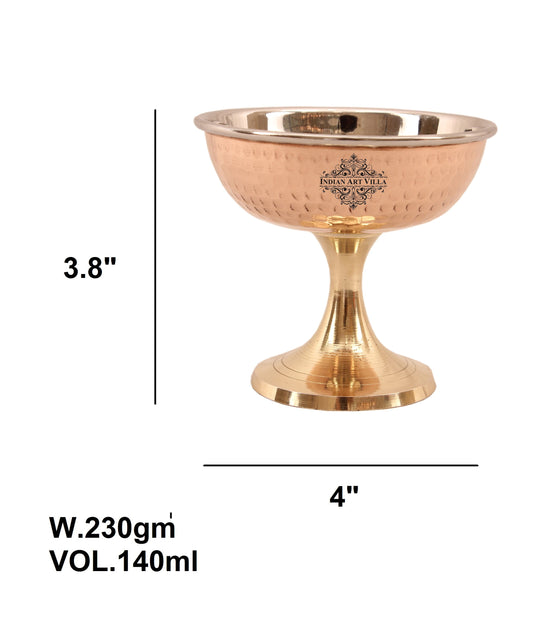 Unique copper dessert bowl on a brass stand crafted for elegant serving of ice cream or sweets during special occasions.
