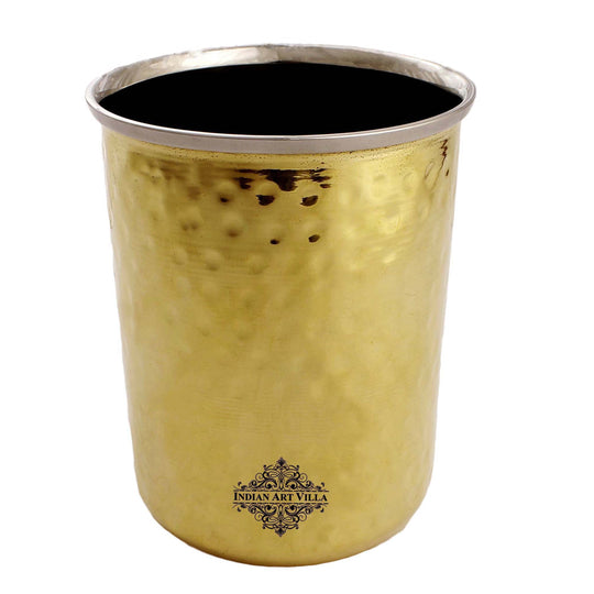Pure steel brass glass with a striking hammered pattern perfect for serving drinks with a refined and classic touch.