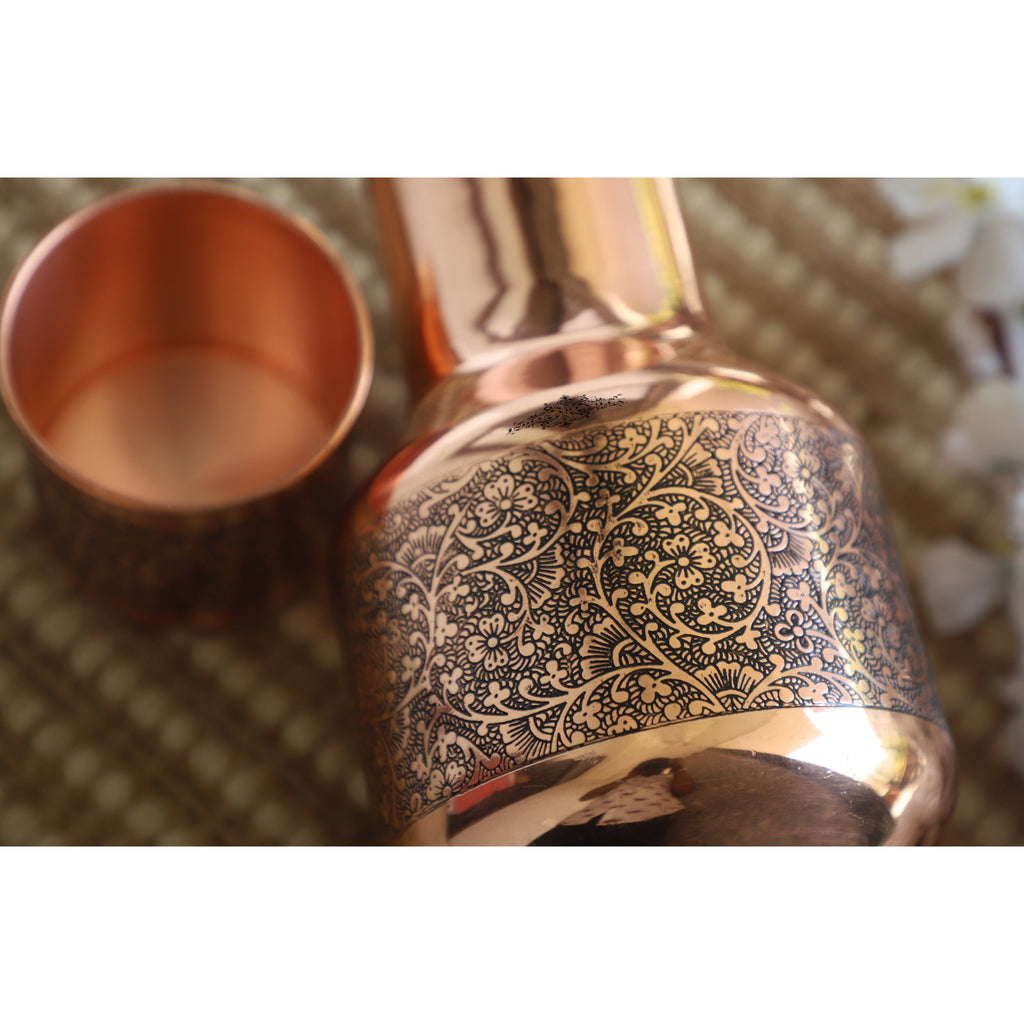 Indian Art Villa Copper Embossed Shine Finish Traditional Ghada Shape bedroom bottle with inbuilt glass, Volume-1500 ML