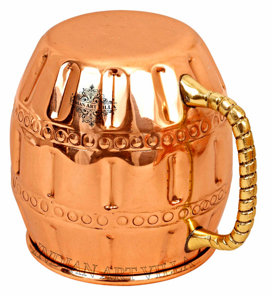 Handcrafted pure copper Moscow Mule mug by round design with grip handle, luxury drinkware for home and bar use.