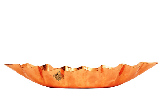 Handcrafted oval copper bread basket with a distinct hammered design bringing elegance to your table and home decor.