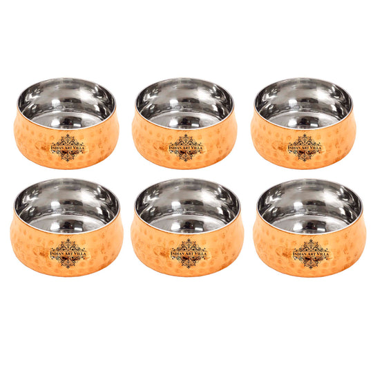 Pair of 6 copper bowls with a distinct hammered texture and smooth steel interior for serving purposes.
