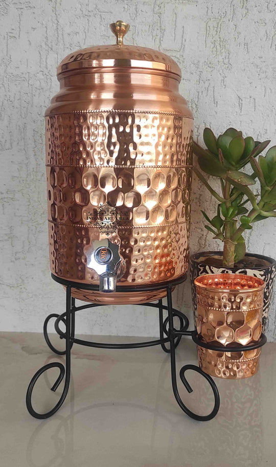 Side angle of 5L round copper pot on stand showing circular body on four legs – copper water pot with stand