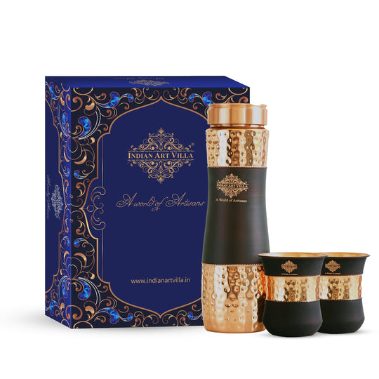 Exquisite copper drinkware set by Indian Art Villa with a hammered texture and black silk finish, perfect for gifting.