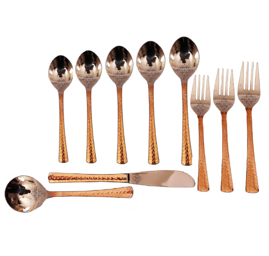 Elegant hammered copper cutlery set from Indian Art Villa with spoons forks and knives for refined table settings