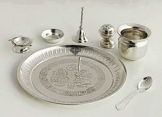 Silver Plated Pooja Thali set, this set includes all the materials that you need to worship your God / Lord. This Beautiful Set looks attractive when kept in your temple.
