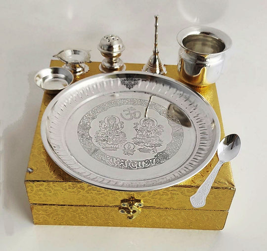 Silver Plated Pooja Thali set, this set includes all the materials that you need to worship your God / Lord. This Beautiful Set looks attractive when kept in your temple.