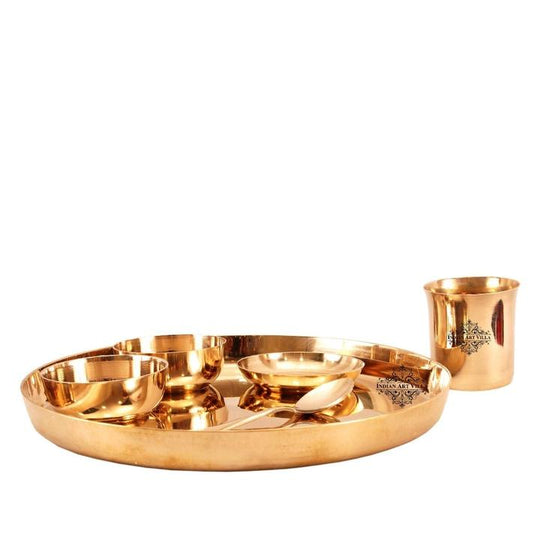 Indian Art Villa Presents Best Quality Bronze Handmade Designer Dinner Set of 6 Pieces that Includes 1 Thali / Plate, 2 Vegetable Bowls, 1 Chutney Bowl, 1 Spoon & 1 Glass. We offer best affordable prices & Free Shipping PAN India. We also offer Easy returns & exchanges. T&C Applied.